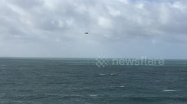 Coastguard helicopter searching off Cornwall in high winds