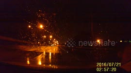 Dashcam catches car spinning off in rain RAW file