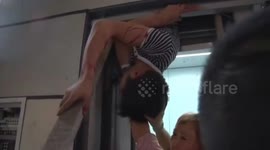 Firefighters rescue a worker stuck in elevator