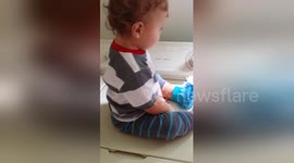 Newsflare Edit - Baby dancing to the rhythm of a washing machine