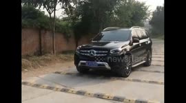 That'll be a choppy ride: Beijing road is chockfull of speed bumps