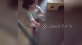 Newsflare Edit - ADORABLE BABY GRABS BUNNY WITH NO FEAR