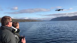 Man Hand Catches Drone from Yacht in Norway Fjord