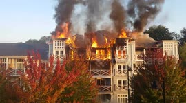 Firefighters tackle huge blaze at block of flats in Kent, UK