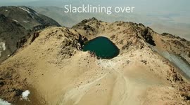 Daredevil Alexander Schulz set slackline world record over highest located lake of the world (Mt. Sabalan, Iran, 4811 masl)