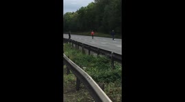Bored commuters play motorway football