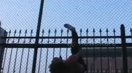 Man gets foot stuck on railings hanging upside down