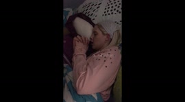 My daughter taping me sleeping thinking I look funny cause I'm trying while I sleep she thought ha ha