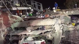 Search for seamstresses in a factory after earthquake