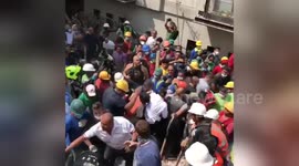 ORIGINAL: Mexico quake survivor carried away on stretcher