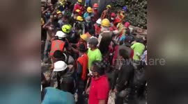Mexico quake survivor carried away on stretcher