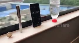 Coin balance test on 'fastest bullet train'