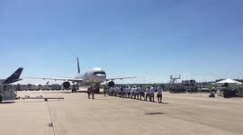 Arlington, Virginia Sheriff's Office Employees Pulls 82-ton FedEx Airbus A320 Plane 12 Feet during Fundraising Competition for Special Olympics Virginia Athletes at Dulles International Airport