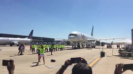 CARFAX Employees Pull  82-ton FedEx Airbus A320 Plane during Fundraising Competition for Special Olympics Virginia Athletes at Dulles International Airport