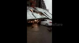 Falling billboard smashes cars in heavy China winds