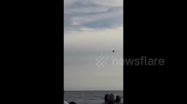 Shocking moment typhoon jet crashes into sea