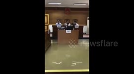 Judge holds session in flooded courthouse