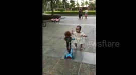 Plucky poodle steals scooter from toddler - and rides away