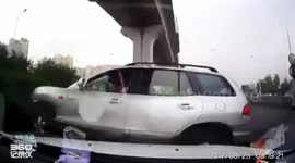 SUV forcing to change lane flips over on motorway