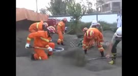 Lorry tips over onto scooter driver in China