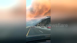 Driver captures dramatic footage of fast-moving California fire
