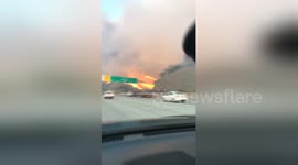 Newsflare Edit - Driver captures dramatic footage of fast-moving California fire