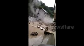 Houses collapse in southern China mudslide