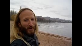Kyrgyzstan. Kirguistán. Cholpon Ata. Issik Kul lake. Beach and snowed mountains views. 2015