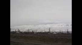 Kyrgyzstan. Kirguistán. From Bishkek to Cholpon Ata. Snowed mountains views. 2015