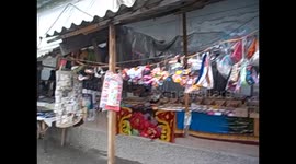 Kyrgyzstan. Kirguistán. Karakol. Jakshilik Bazar. Market. Shops in containers. 2015