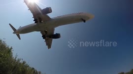 Standing beneath a plane coming into land 2