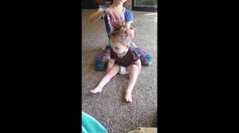 Toddler playing dead