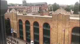 2 Metropolitan Policeman on motorbike on top of NCP Car park