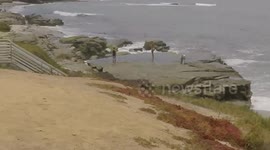 EPIC FAIL !!! Girl Slips on Rock and Slides Down !
