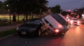 Crash leaves one car on top of another in New Jersey