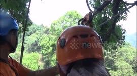 Zip wire Adventure. Extreme Sports in Chiang Mai, Thailand. Person on Zip Wire.