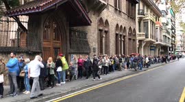 Crowd waits to vote in Barcelona on day of Catalonia independence referendum