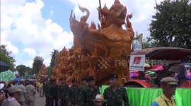 Huge Wax Candles on floats at a festival in Thailand
