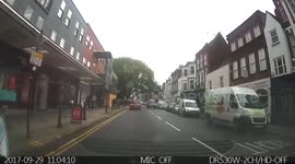 Runs a red light as loads of school kids are about to cross