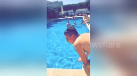 Newsflare Edit - Sleeping friend on lads holiday thinks he's drowning in his sleep prank