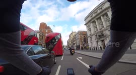 Morning Commute Through London - Red London buses - Trafalgar Square
