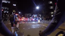 Filtering through red buses night London 13 Feb 17 6pm
