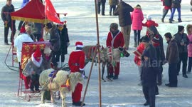 Santas in Harbin,China during the Snow and Ice Festival