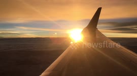 Sunset on airplane when flying