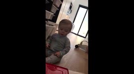 Baby scared by Jack in the Box