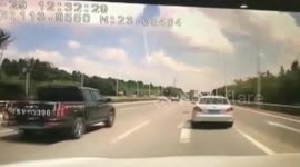Spectacular dash cam video captures moment flying plank smashes windscreen