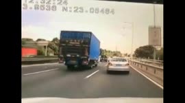 Flying plank smashes car windscreen on highway
