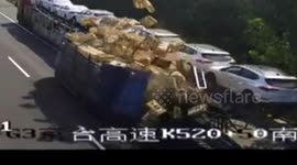 Lorry crash leaves dozens of baskets containing ducks on motorway