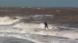 Kitesurfers in UK's northwest take flight in gusty conditions