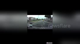 Newsflare Edit - Front view of bus dangerously overtaking